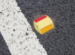 Yellow and red road stud.jpg